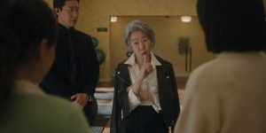 Jason Jin as JB, Youn Yuh-jung as Chairwoman Park in episode 202 of 'Beef'.