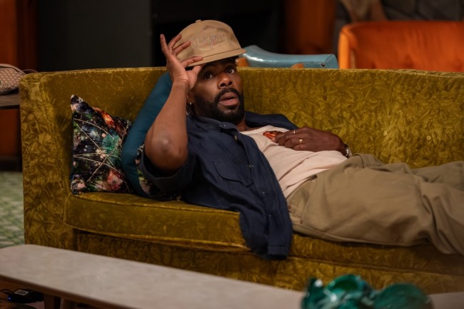 THE FOUR SEASONS SEASON 2 stars Colman Domingo as Danny, shown here laying on the couch lifting a stylish cap over his head