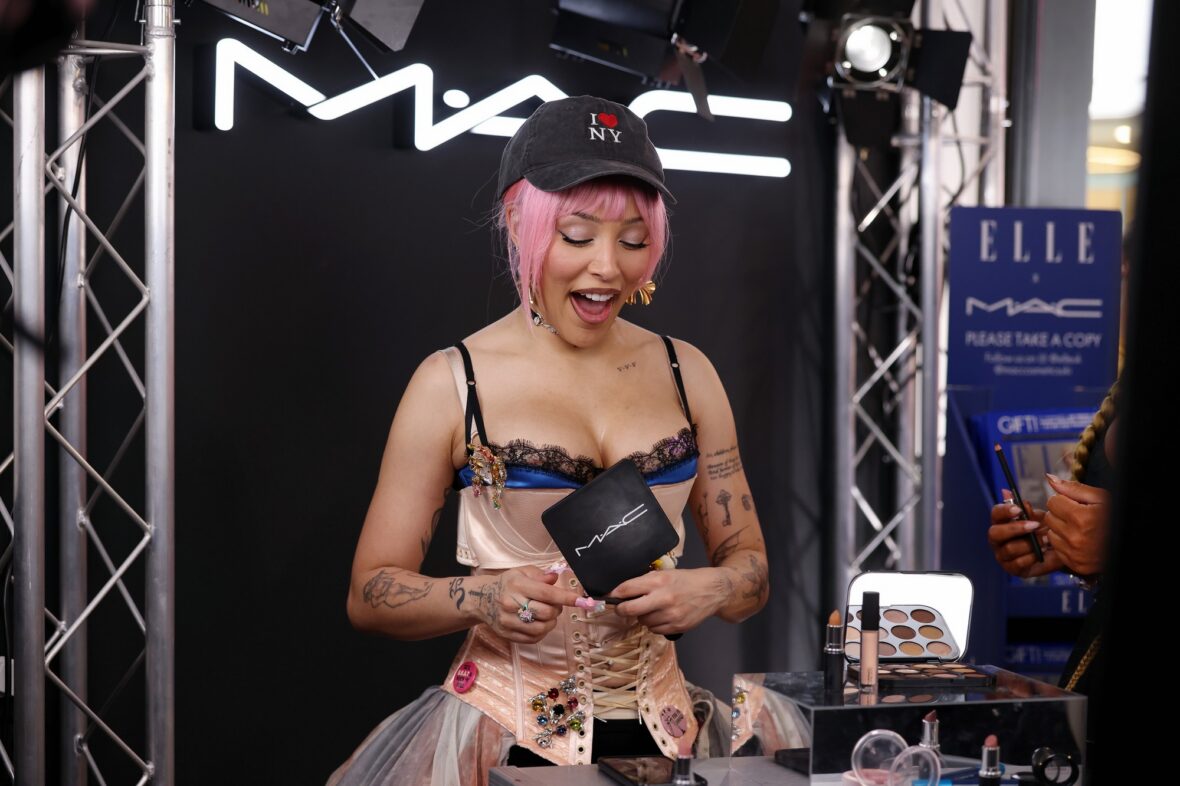 Doja Cat wears a corset and baseball cap to MAC activation in London