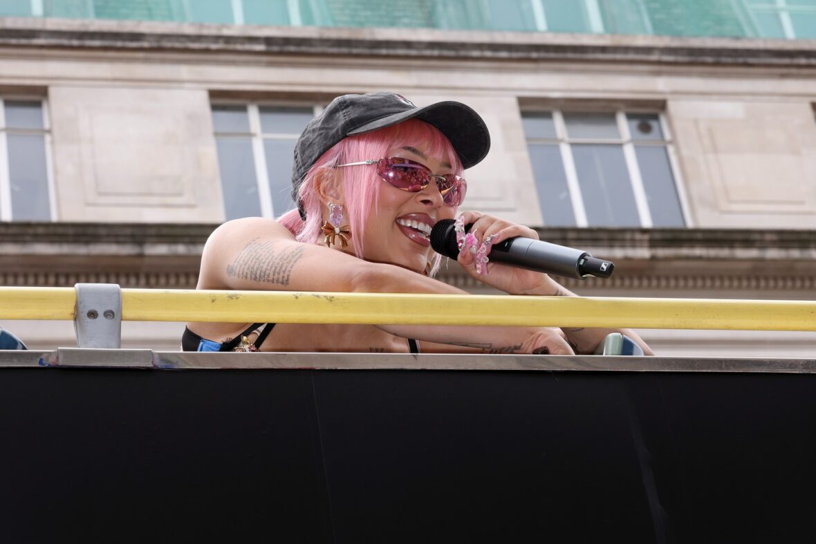Doja Cat wears a corset and baseball cap to MAC activation in London