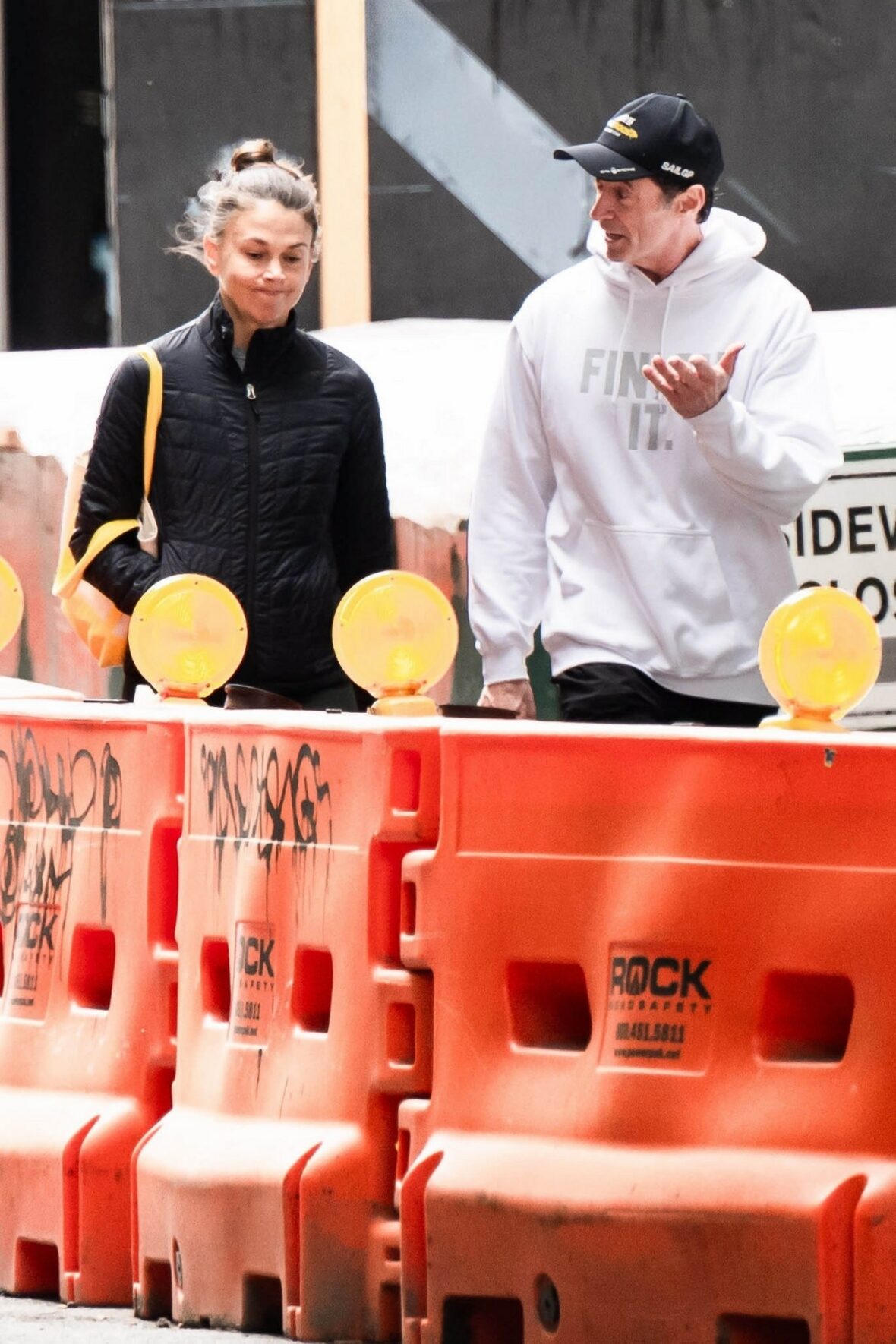Sutton Foster and Hugh Jackman walking side by side