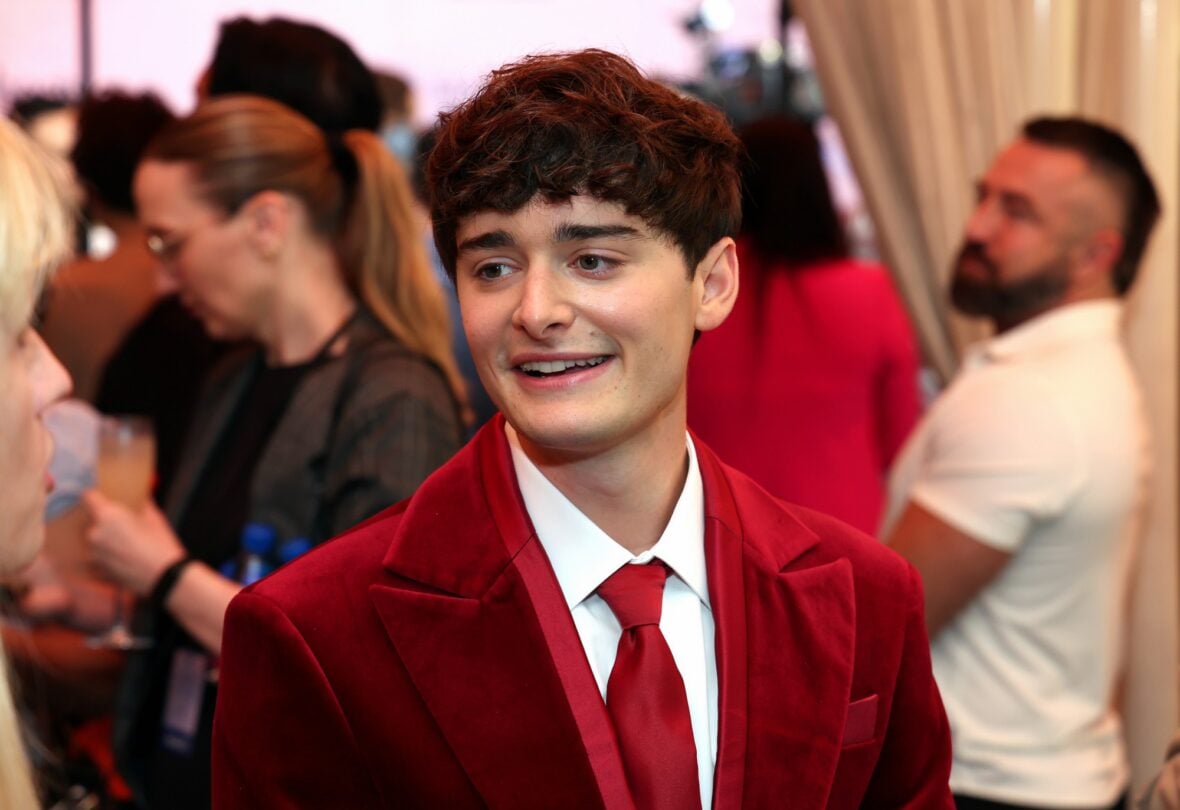 Noah Schnapp posing on the red carpet at the Celebration of LGBTQ+ Cinema & Television