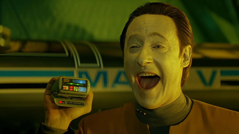 Data (Brett Spiner) uses Mr. Tricorder in 