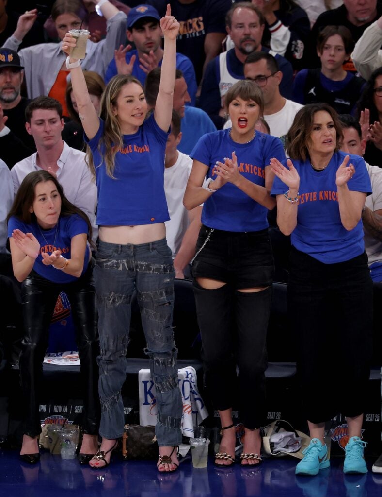 Alana Haim, Este Haim, Taylor Swift, and Mariska Hargitay cheering courtside during NBA Finals