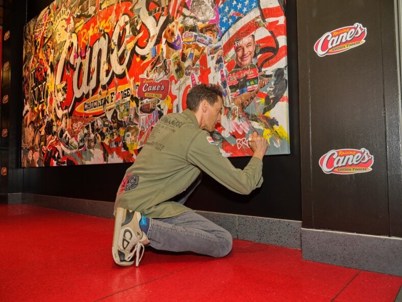 Adrien Brody designs mural for Raising Cane's
