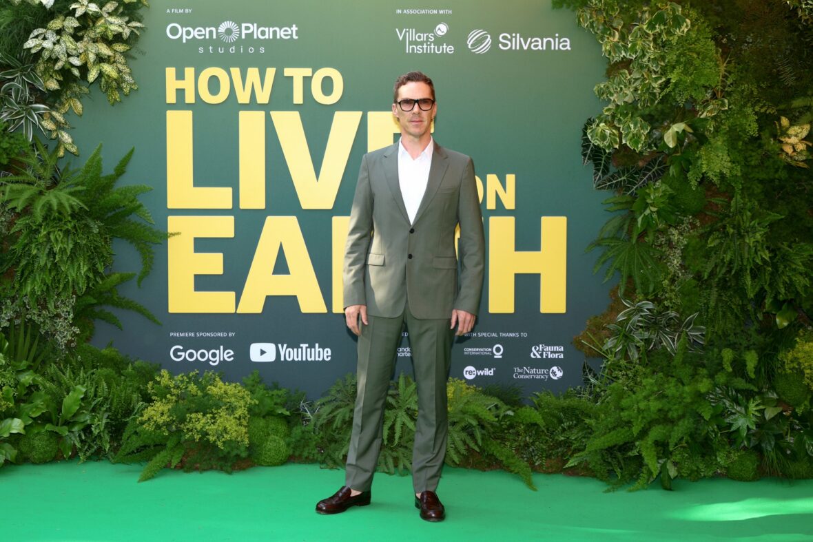 Benedict Cumberbatch poses for photos on the world premiere red carpet of "How to Live on Earth"
