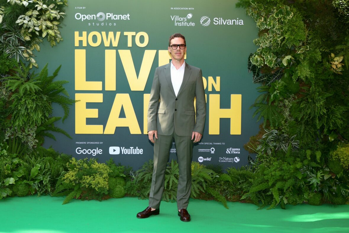 Benedict Cumberbatch poses for photos on the world premiere red carpet of "How to Live on Earth"
