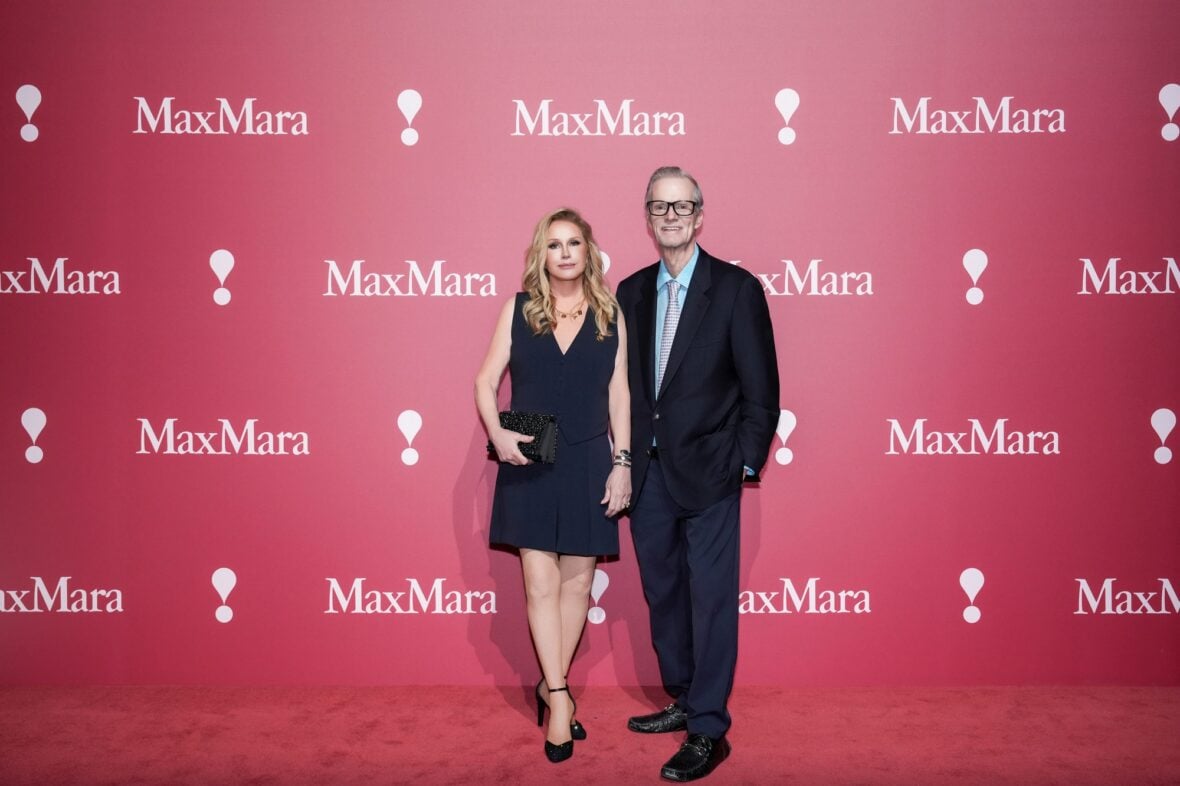Kathy and Rick Hilton pose at the Max Mara fashion show in Shanghai