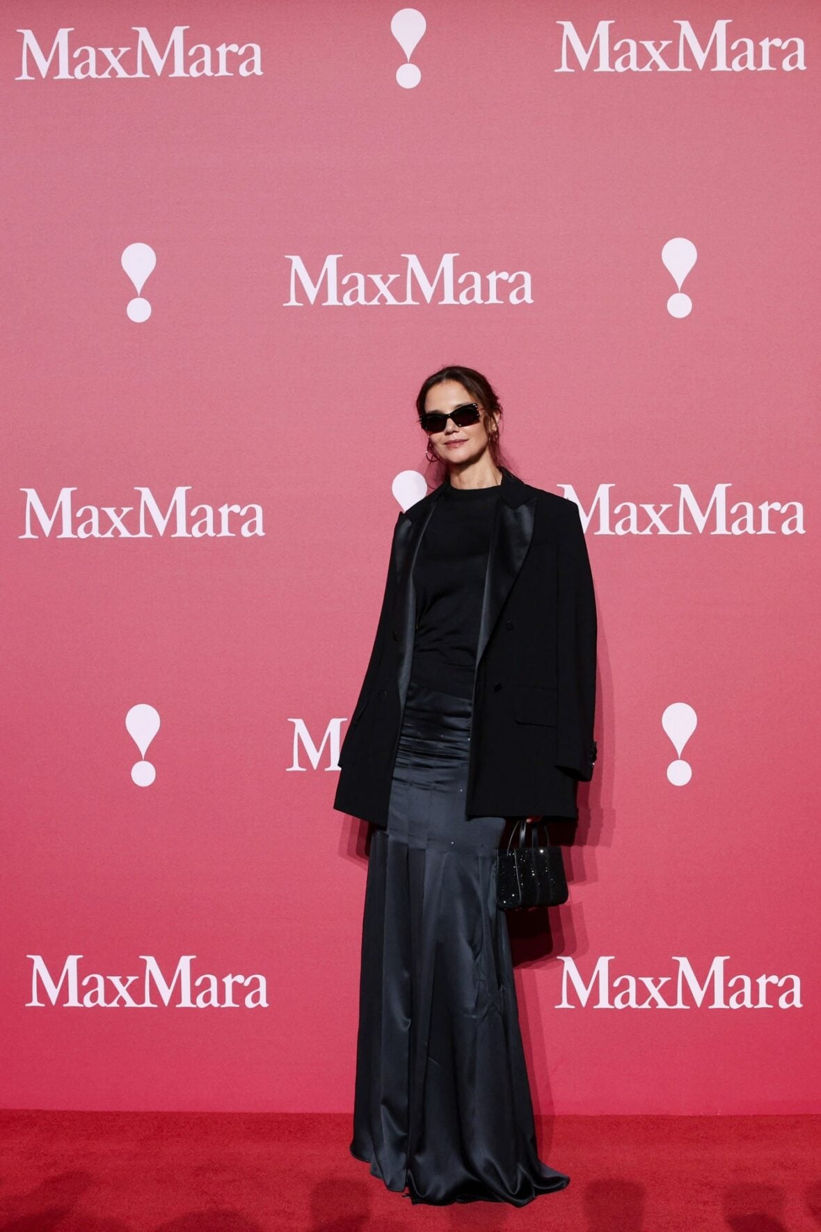 Katie Holmes poses at the Max Mara fashion show in Shanghai