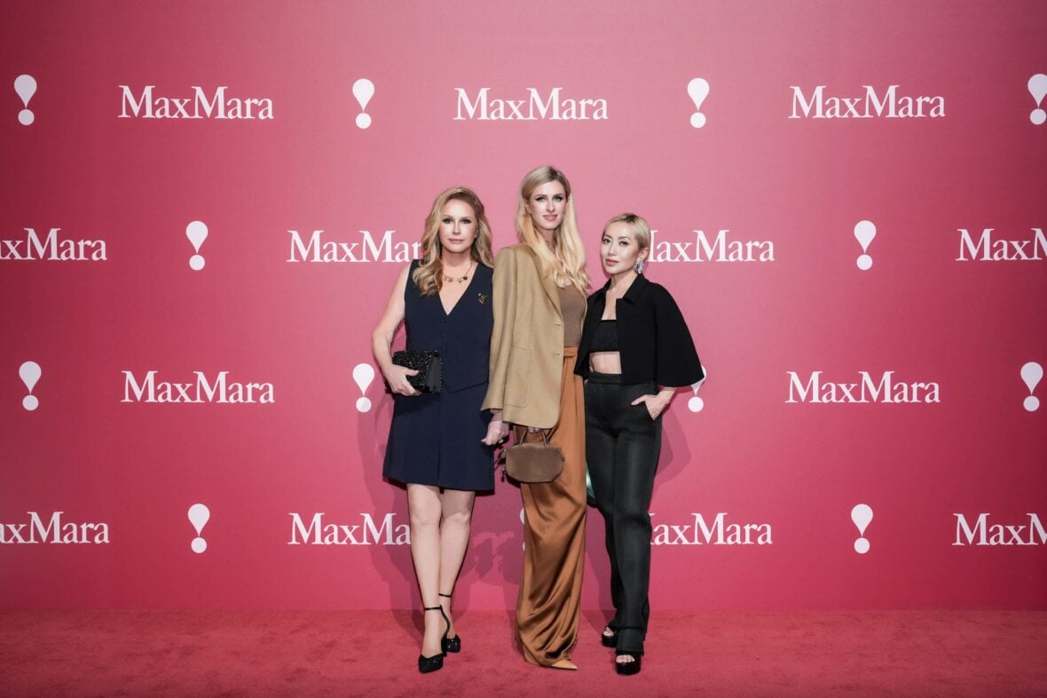 Kathy and Nicky Hilton pose at the Max Mara fashion show in Shanghai