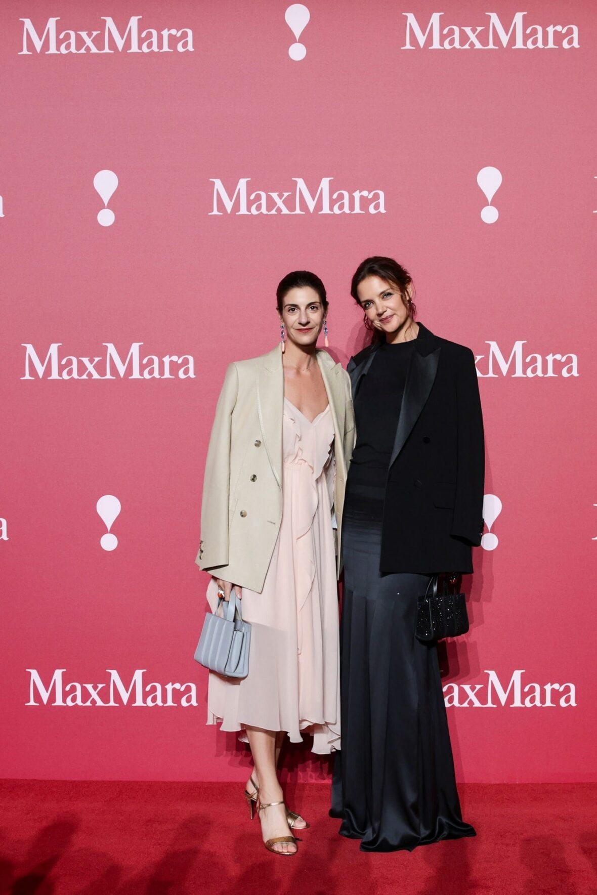 Katie Holmes poses at the Max Mara fashion show in Shanghai