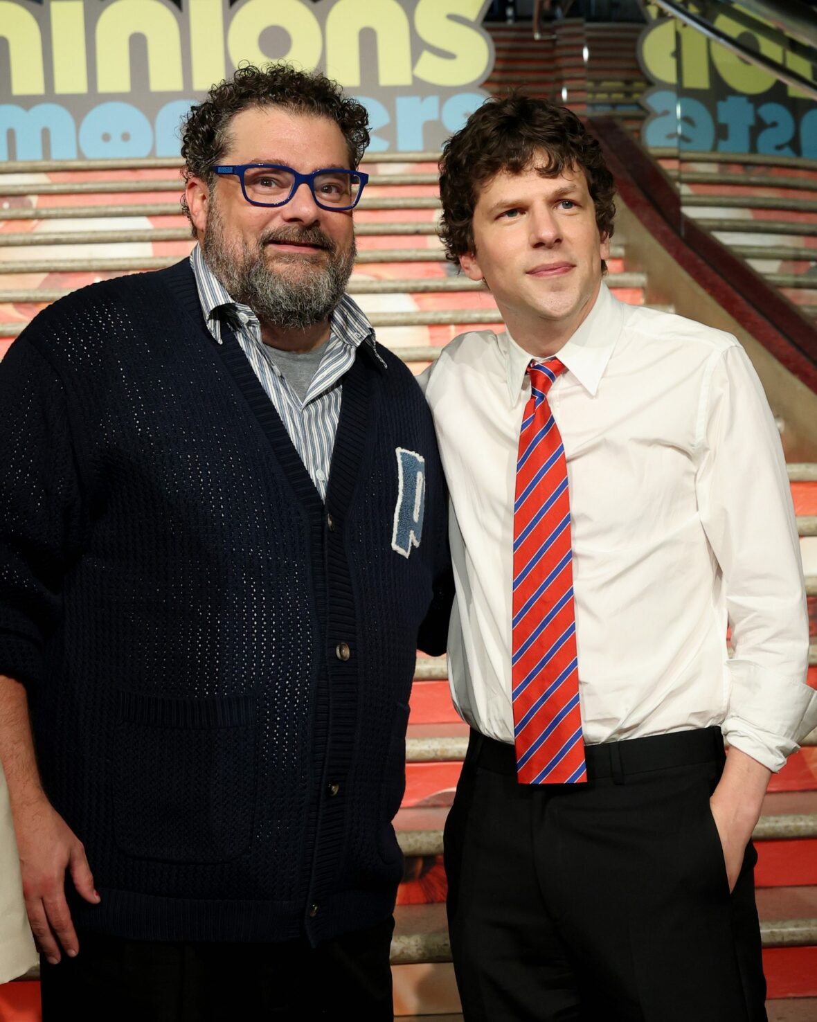 Bobby Moynihan and Jesse Eisenberg attends Minions & Monsters premiere