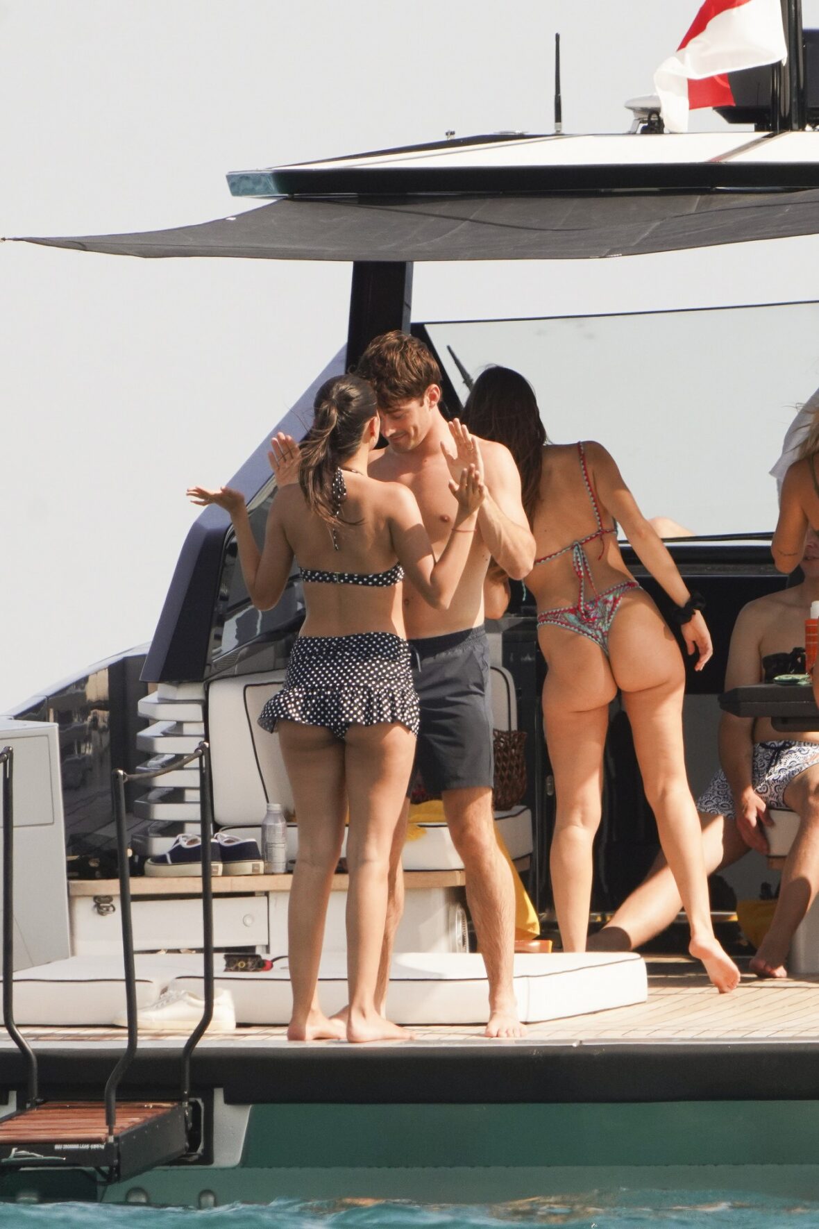 Charles Leclerc and Alexandra Saint Mleux aboard a boat in Saint-Tropez