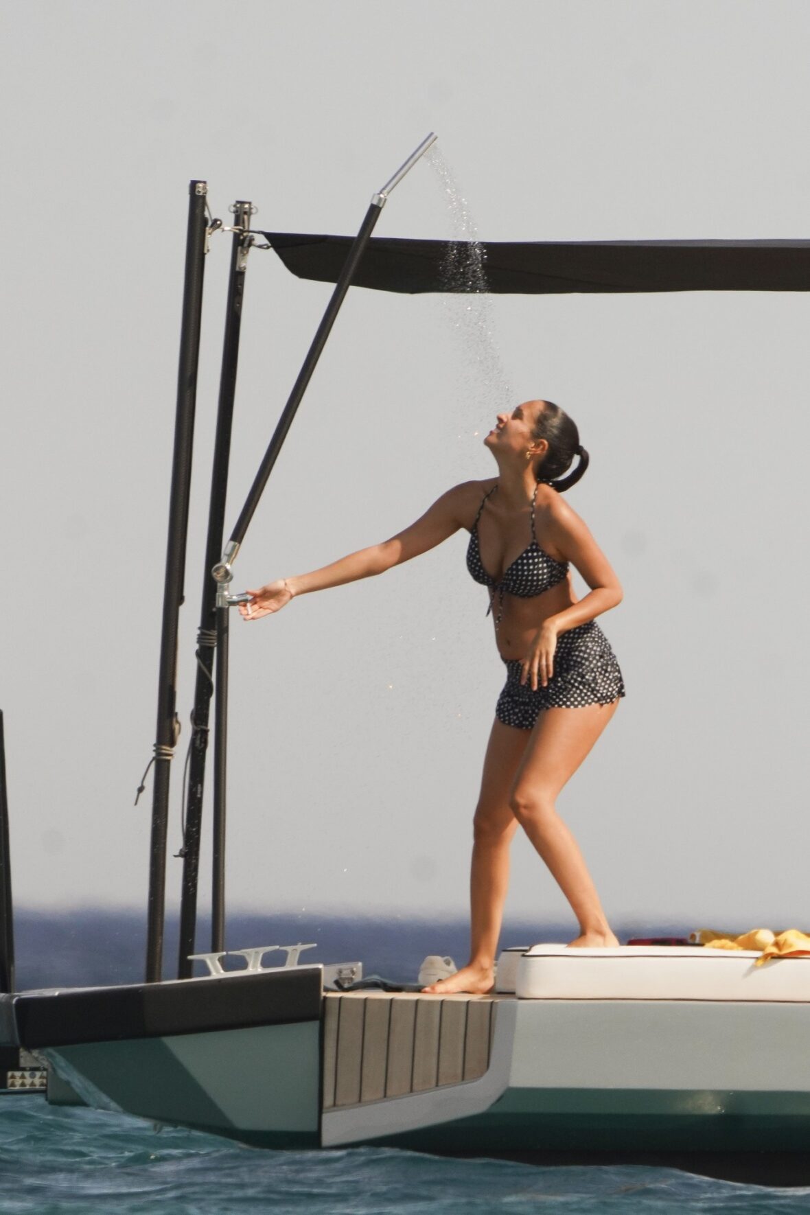 Alexandra Saint Mleux showers aboard a boat in Saint-Tropez