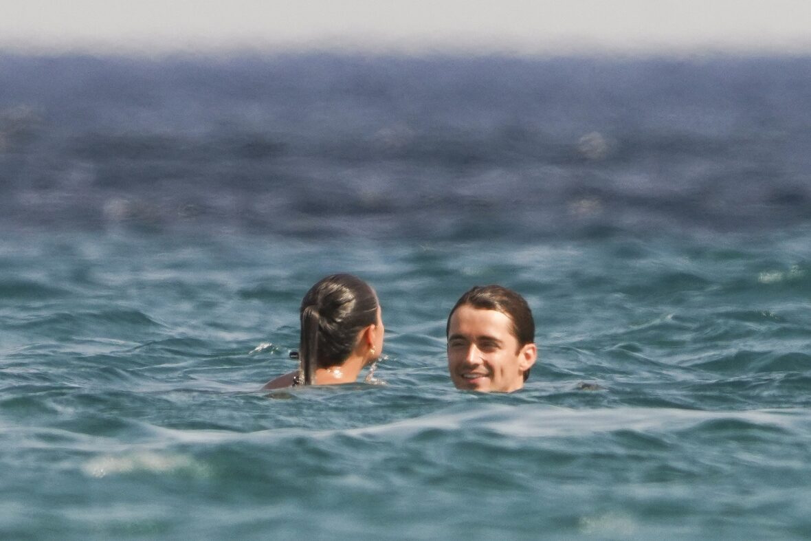 Charles Leclerc and Alexandra Saint Mleux swim in the water in Saint-Tropez