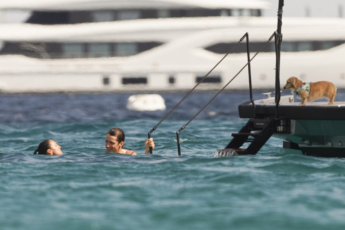 Charles Leclerc and Alexandra Saint Mleux swim in the water in Saint-Tropez