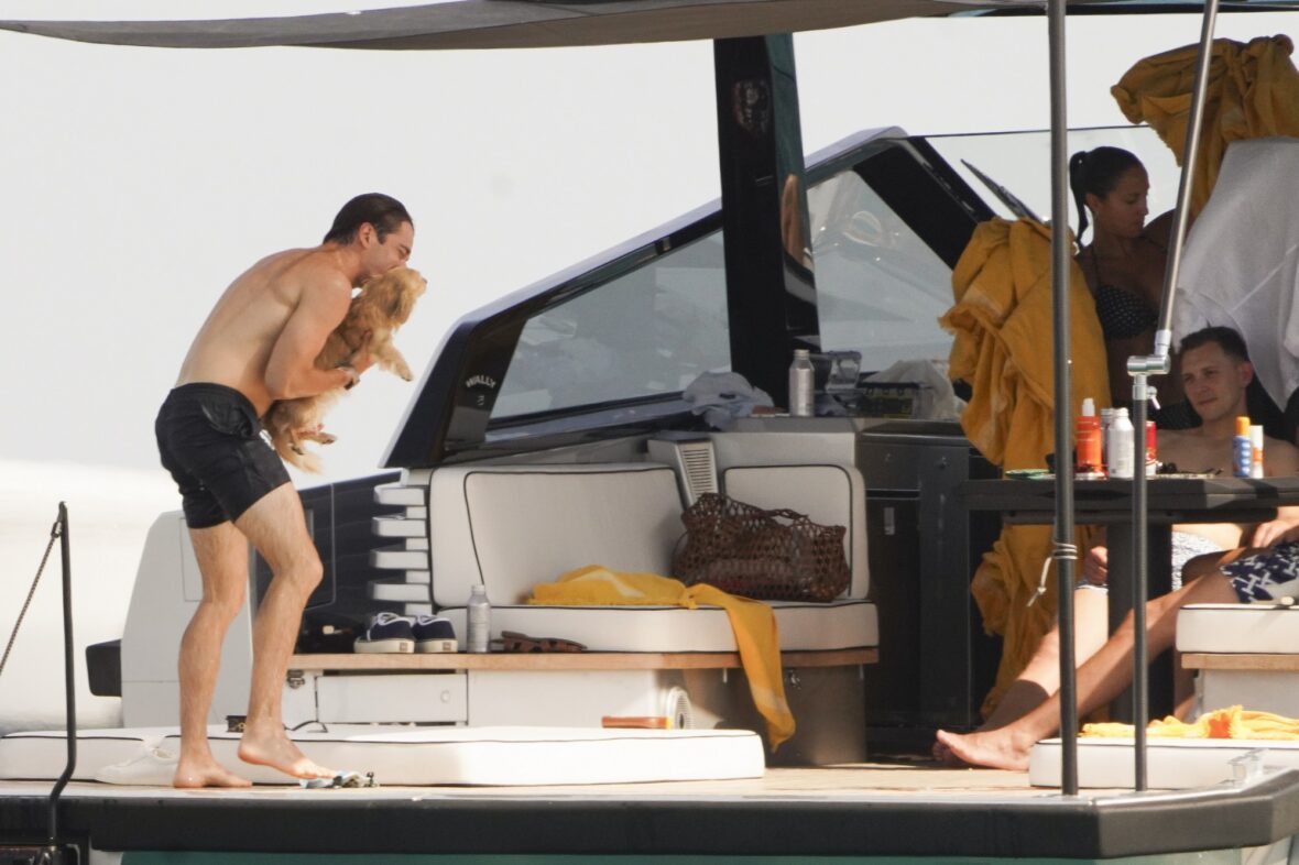 Charles Leclerc and pup Leo aboard a boat in Saint-Tropez