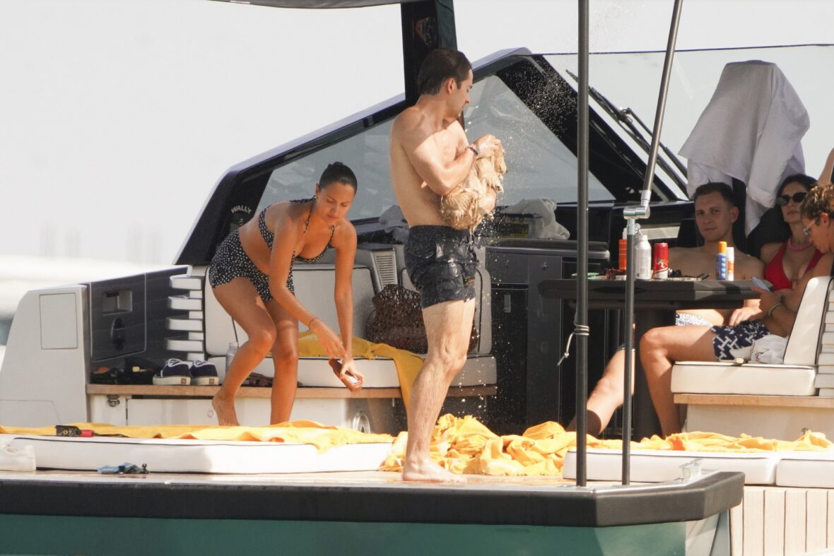 Charles Leclerc and pup Leo aboard a boat in Saint-Tropez