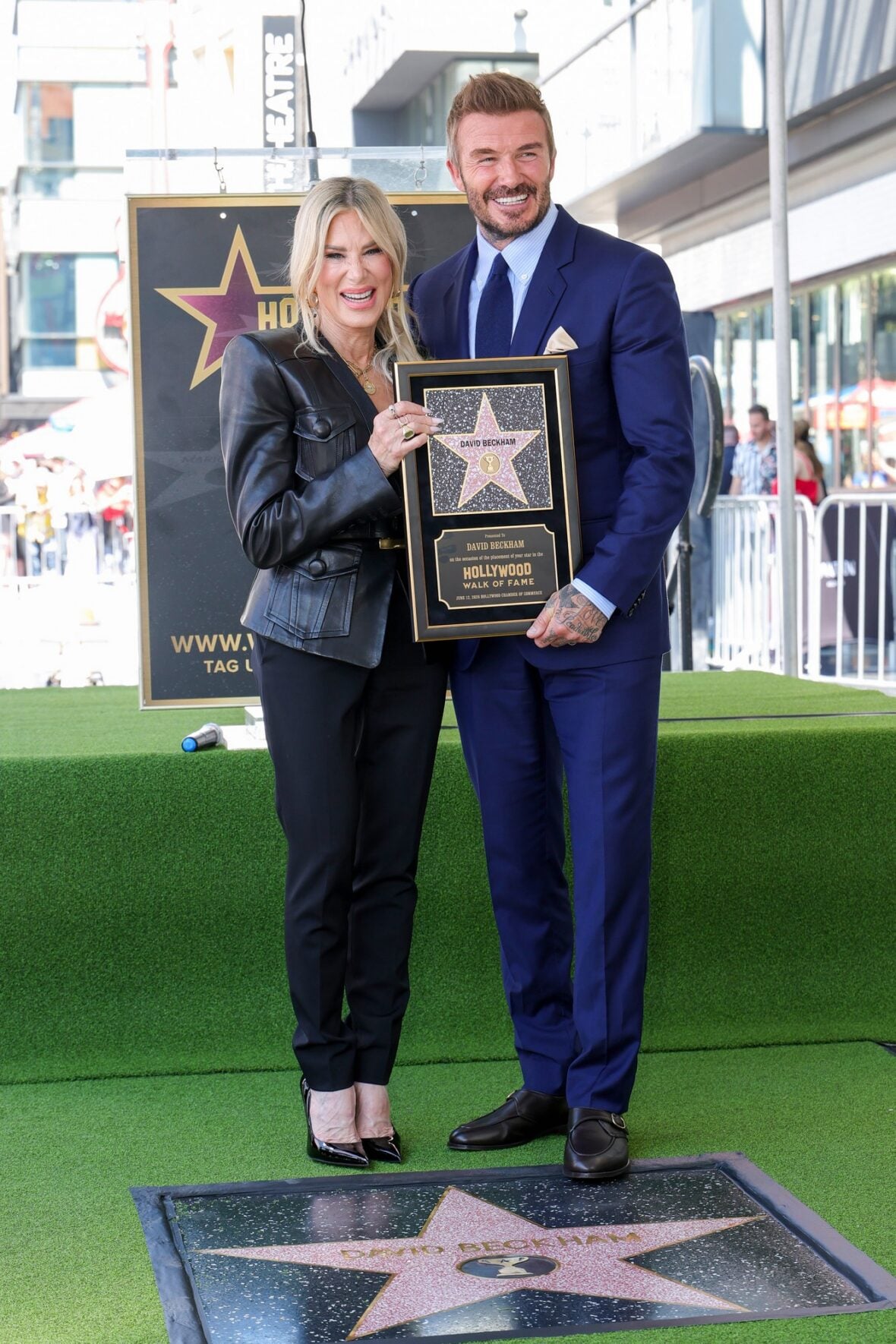 David Beckham poses with his star on the walk of fame
