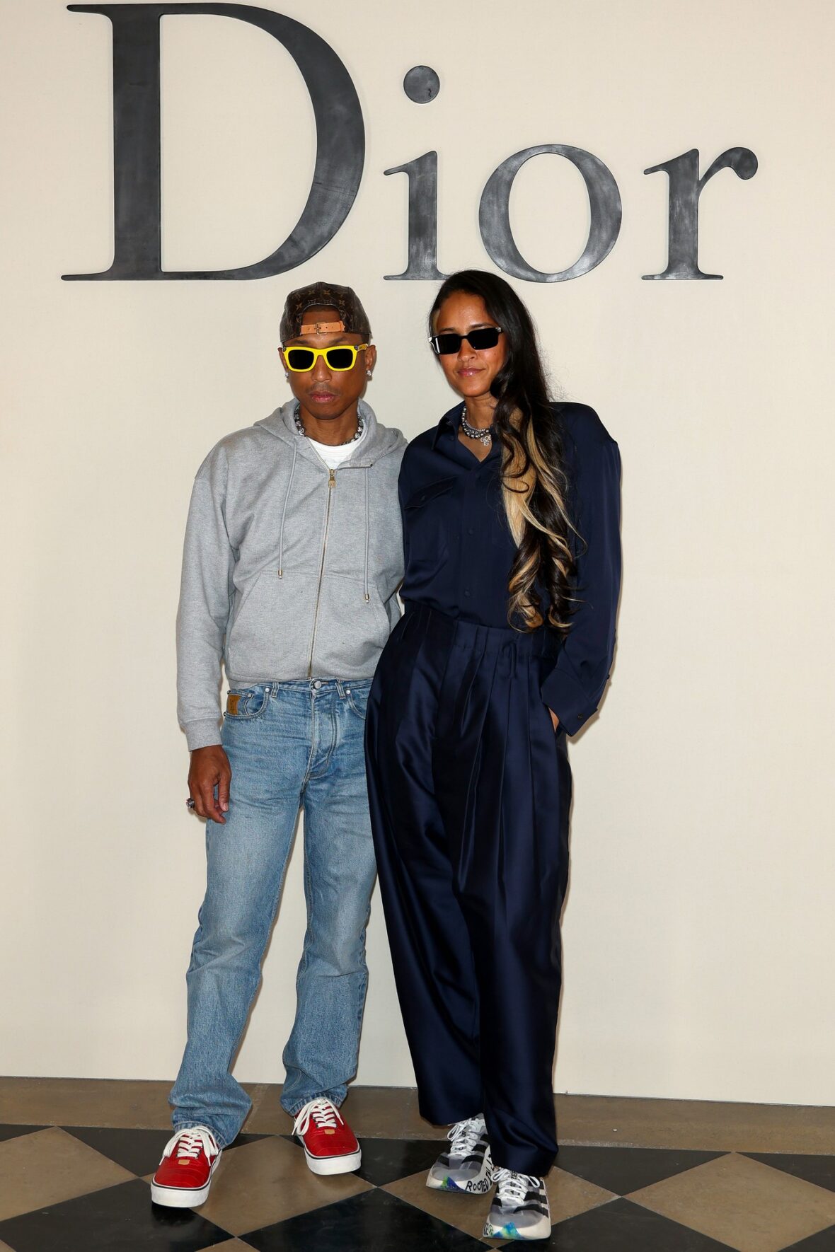 Pharrell Williams and Helen Lasichanh at the Dior show