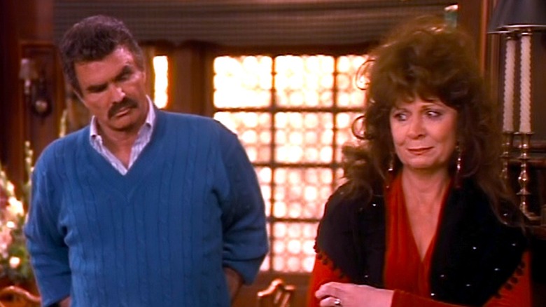 Wood and Merleen standing side-by-side in Evening Shade (1990)