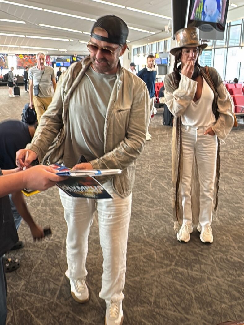 Gerard Butler and Morgan Brown at La Guardia airport