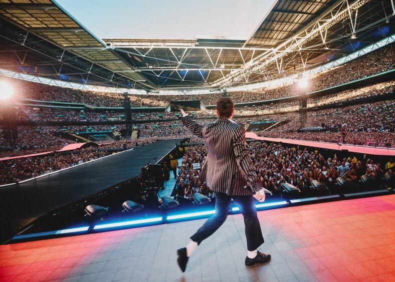 Harry Styles performs in london