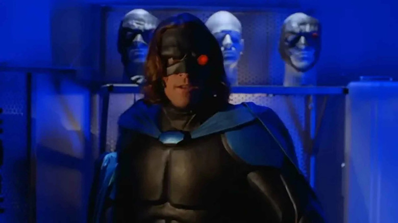 Masked vigilante Night Man dons his costume in the classic 1990s series based on the Malibu Comics series.