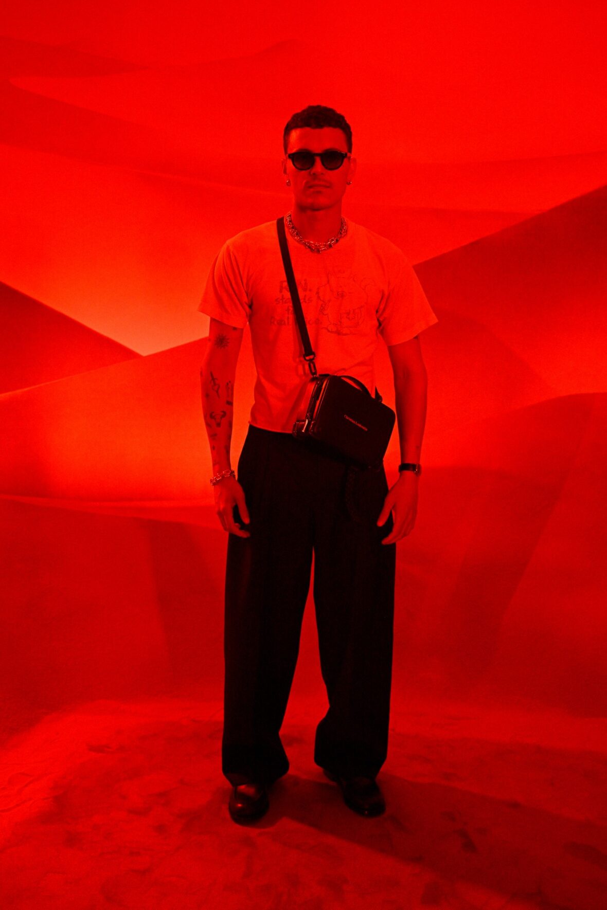 Aron Piper attends Christian Louboutin fashion show
