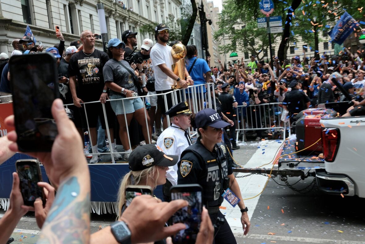 Jalen Brunson with his wife Ali and their daughter at the NYC Knicks parade