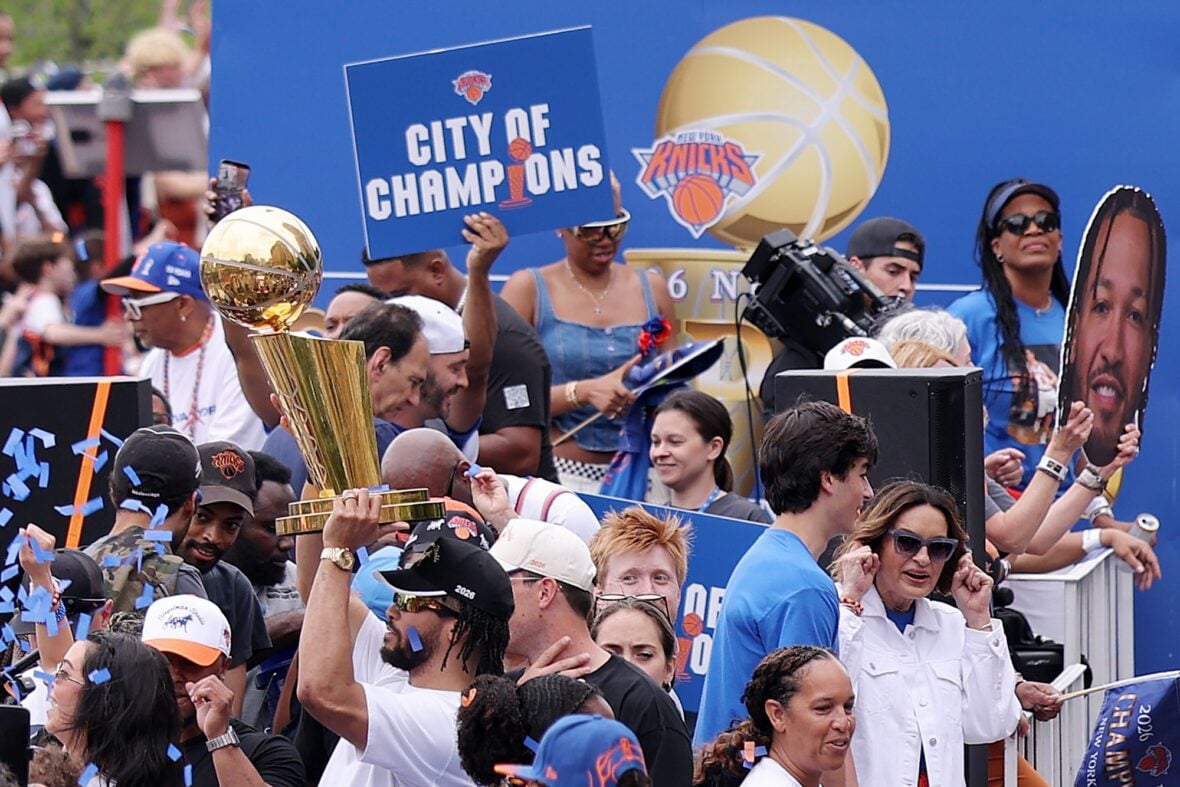 Jalen Brunson with his wife Ali and their daughter at the NYC Knicks parade