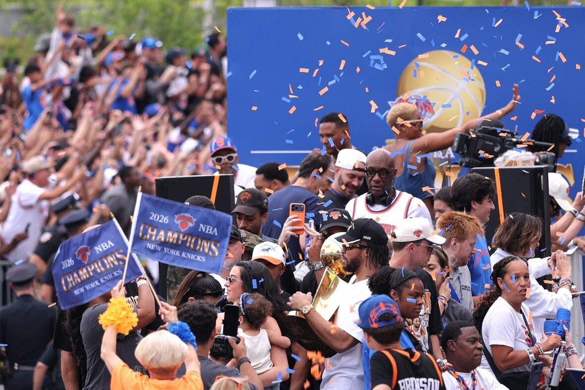 Jalen Brunson with his wife Ali and their daughter at the NYC Knicks parade
