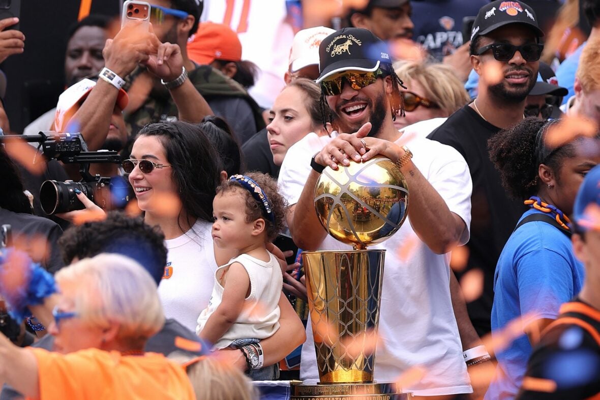 Jalen Brunson with his wife Ali and their daughter at the NYC Knicks parade