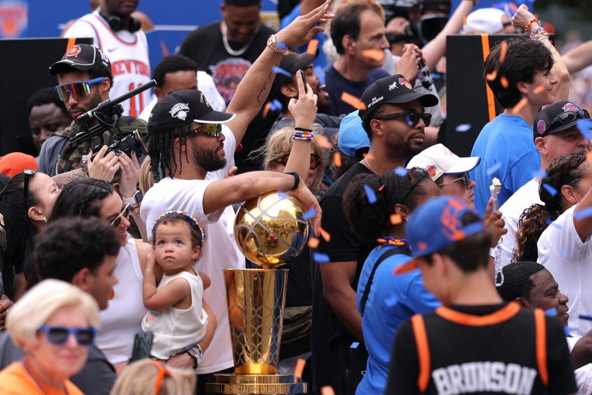 Jalen Brunson with his wife Ali and their daughter at the NYC Knicks parade