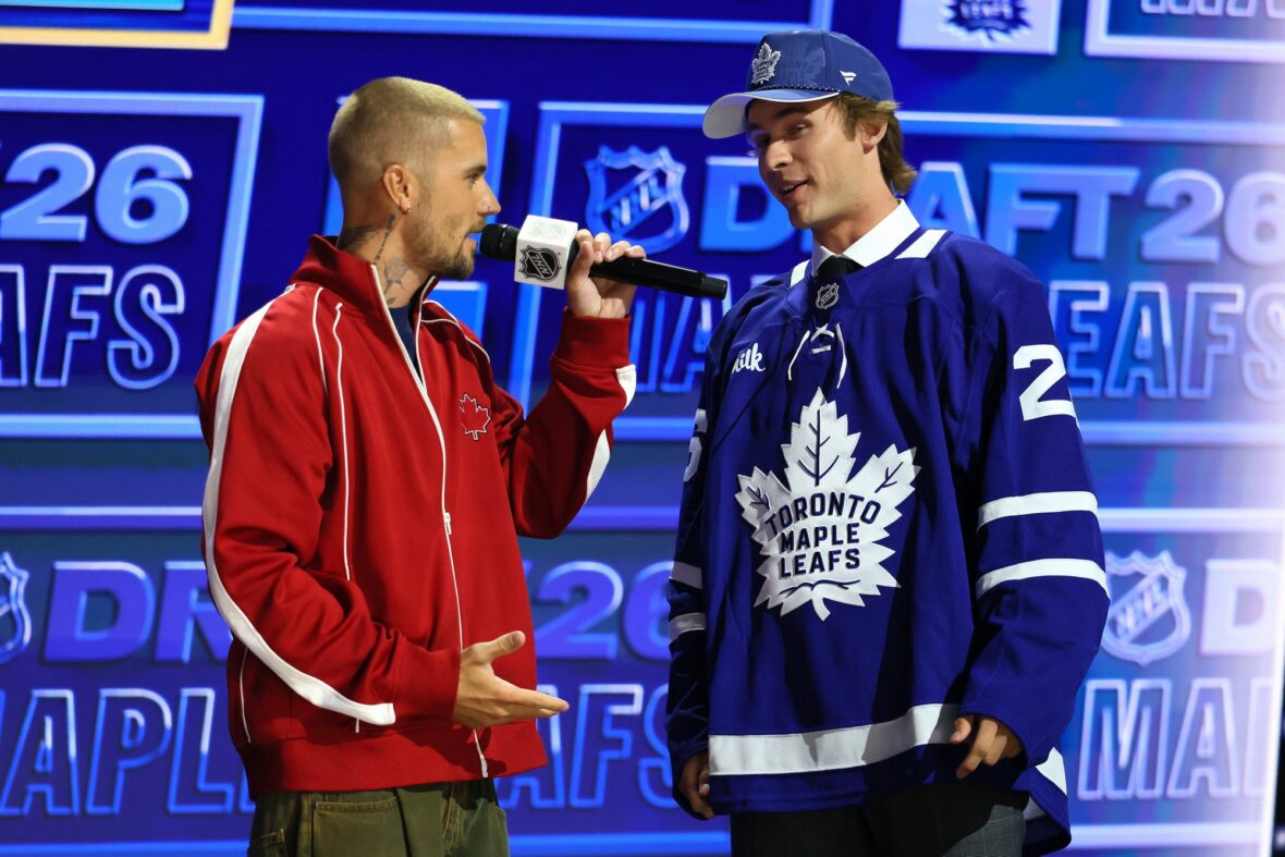 Justin Bieber interviews Gavin McKenna of Canada after McKenna was drafted by the Toronto Maple Leafs