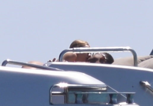 Kylian Mbappé and Ester Expósito kissing on a yacht on vacation during May 2026 trip