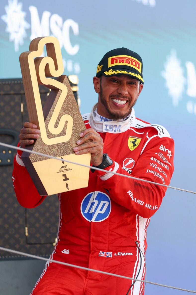 Lewis Hamilton holds up his trophy after winning Barcelona-Catalunya grand prix