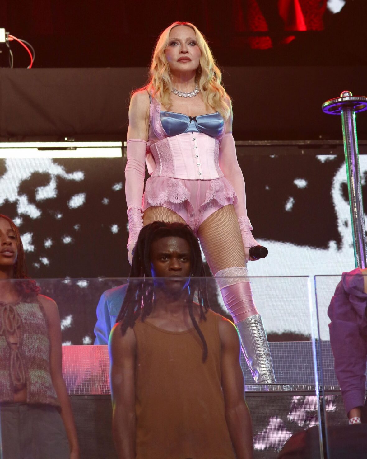 Madonna performs onstage for Times Square concert