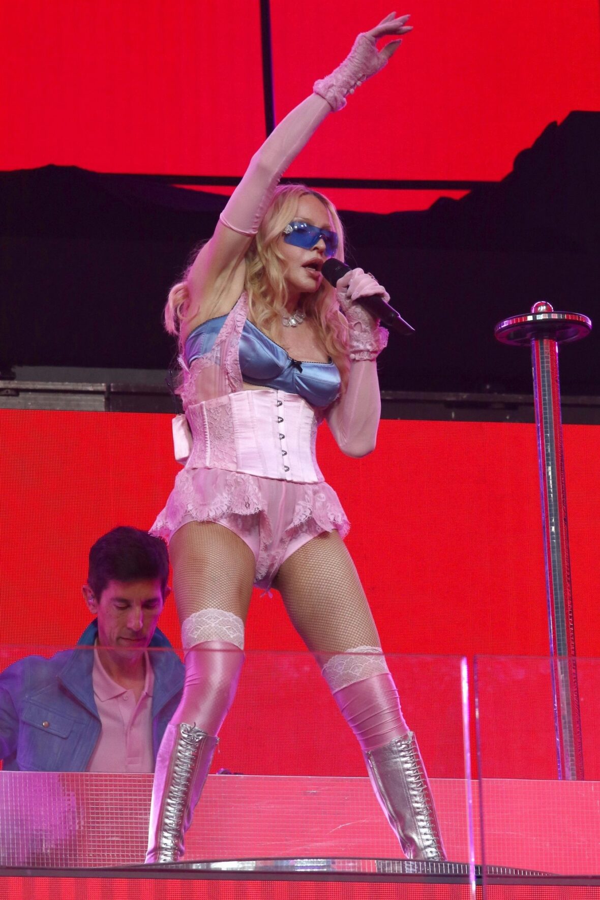Madonna performs onstage for Times Square concert