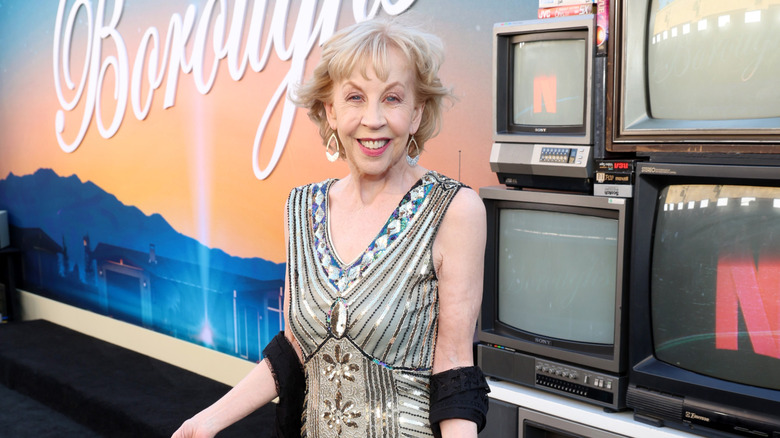 Nancy Daly posing on the 'The Boroughs' red carpet