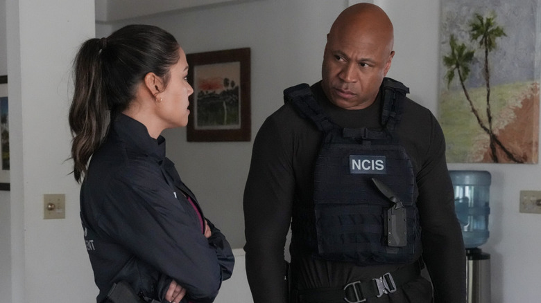Jane Tennant and Sam Hanna standing in a room in NCIS: Hawai'i