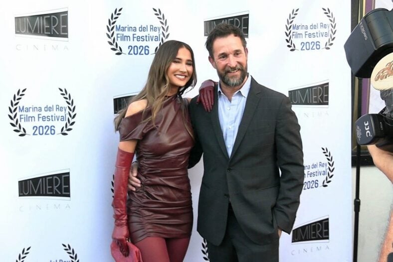 Auden and Noah Wyle pose together at the premiere of her new movie The Vanishing Tour