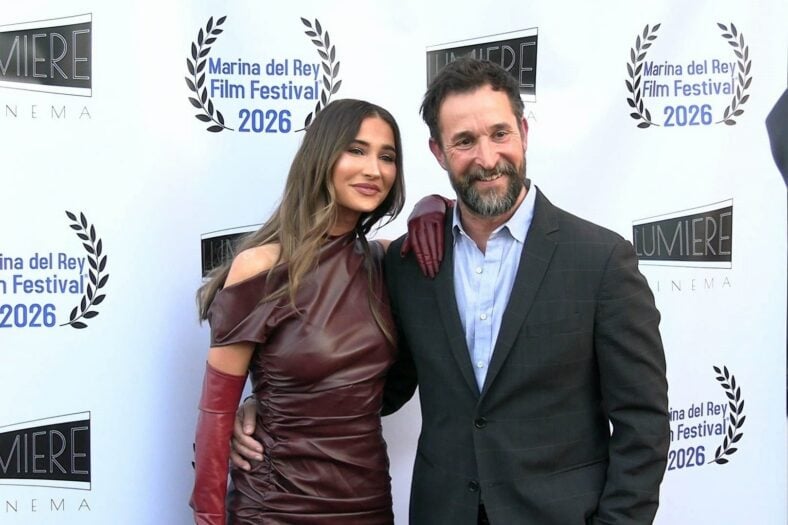 Auden and Noah Wyle pose together at the premiere of her new movie The Vanishing Tour