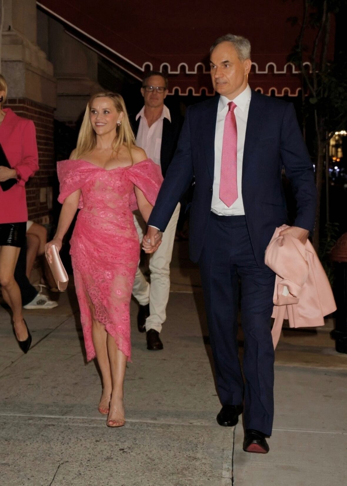 Reese Witherspoon holding hands with her boyfriend Oliver Haarmann