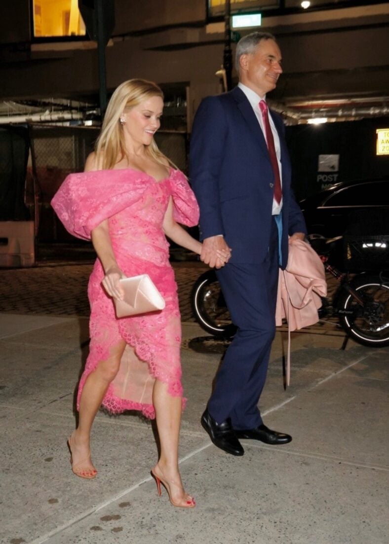 Reese Witherspoon holding hands with her boyfriend Oliver Haarmann