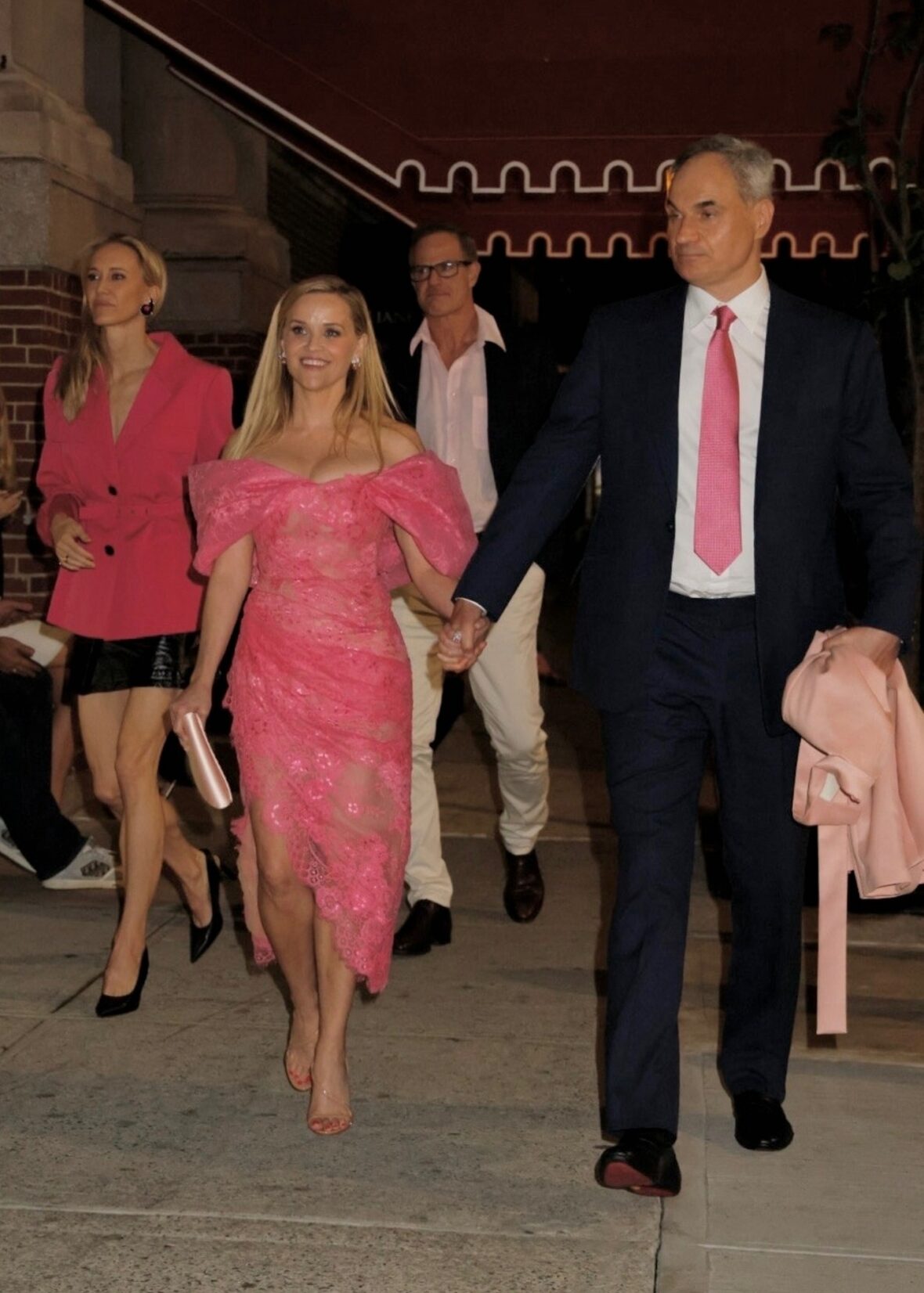 Reese Witherspoon holding hands with her boyfriend Oliver Haarmann