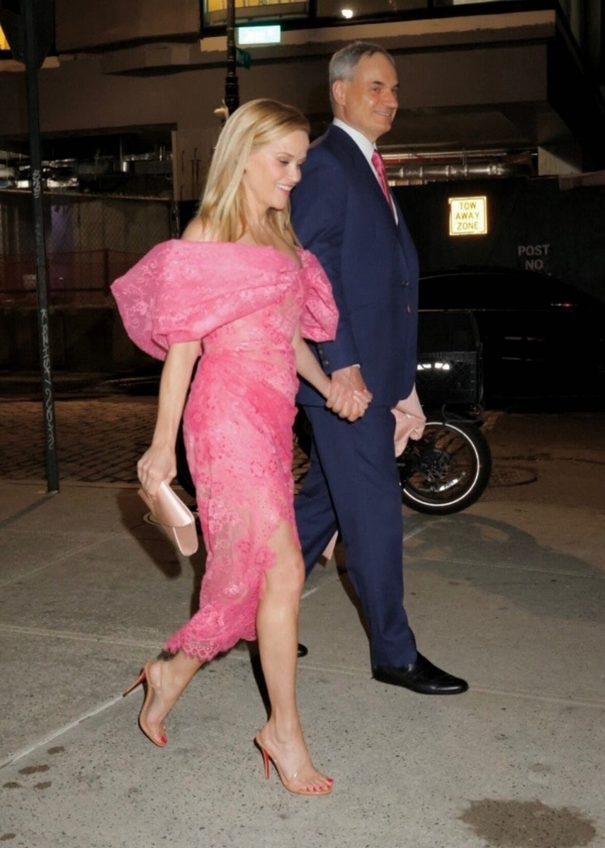 Reese Witherspoon holding hands with her boyfriend Oliver Haarmann