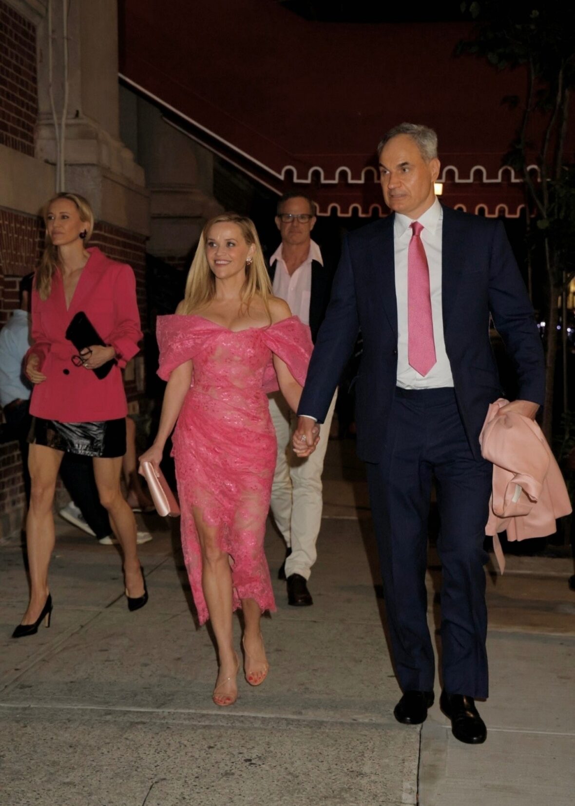Reese Witherspoon holding hands with her boyfriend Oliver Haarmann
