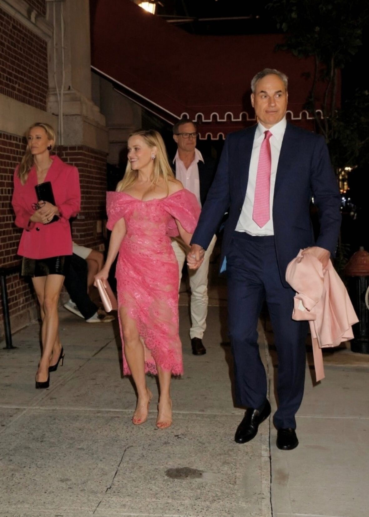 Reese Witherspoon holding hands with her boyfriend Oliver Haarmann