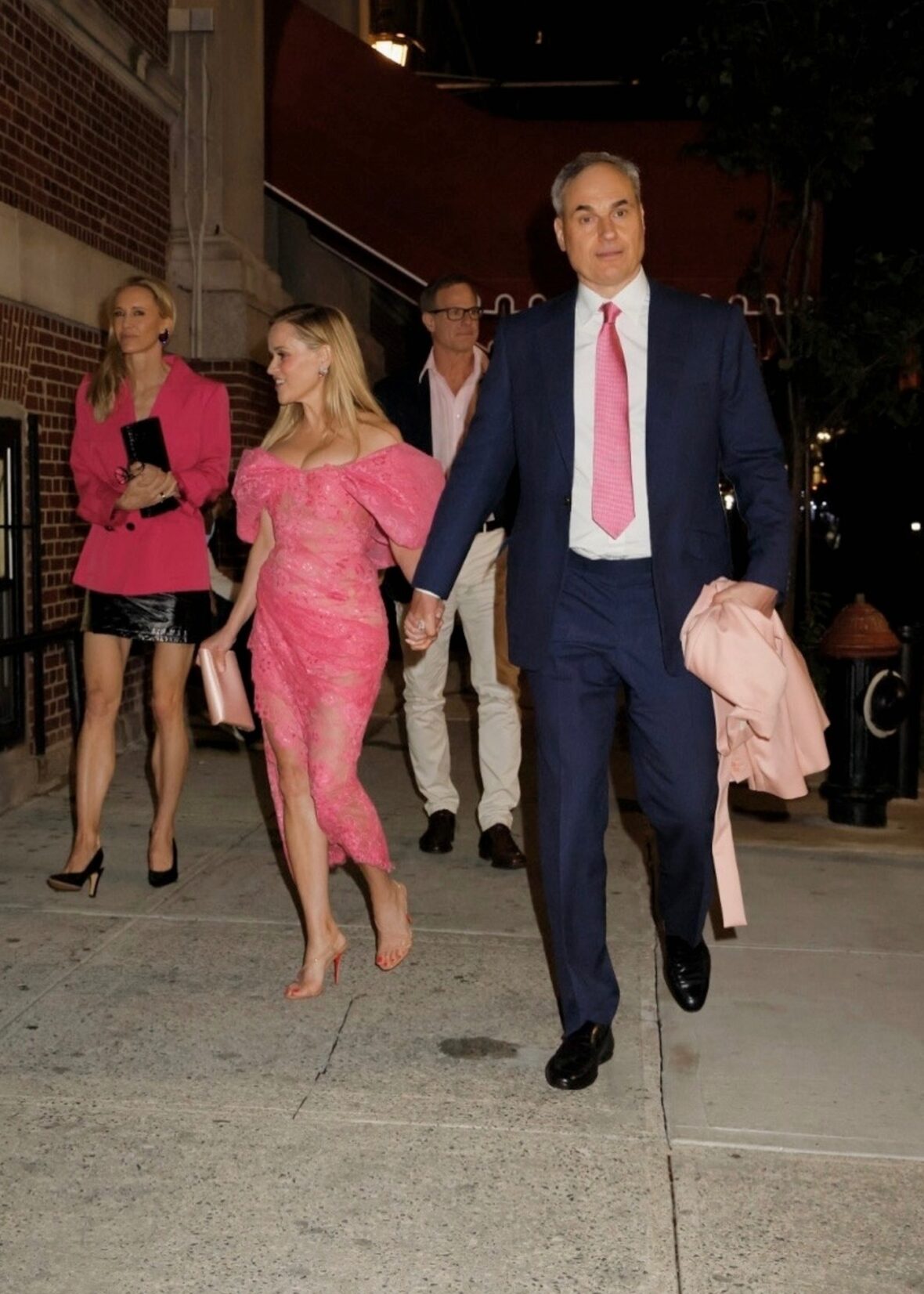 Reese Witherspoon holding hands with her boyfriend Oliver Haarmann